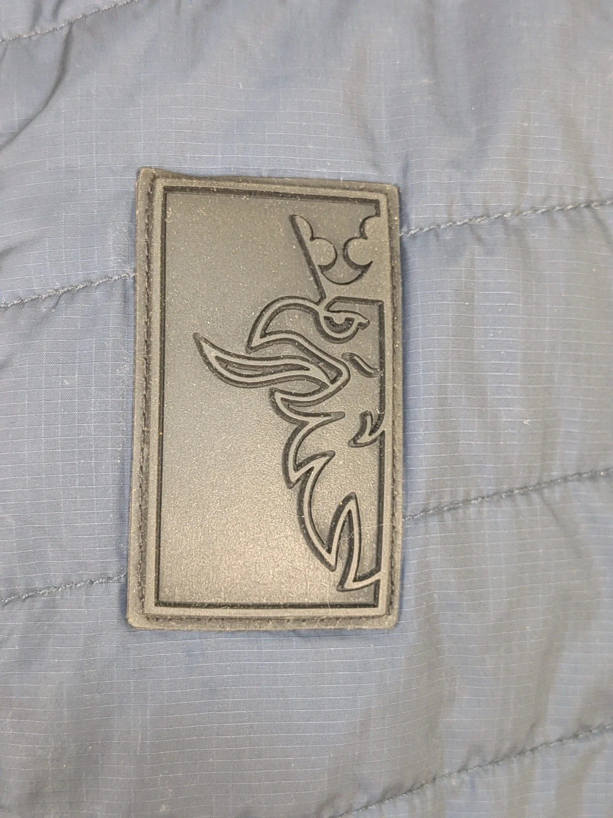Giubbino trapuntato Scania Official Merchandise blu scuro con cappuccio e patch gommata