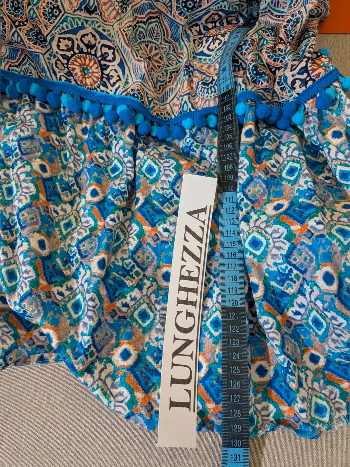 Per Una blue linen maxi dress with geometric mandala pattern and royal blue pompom details.