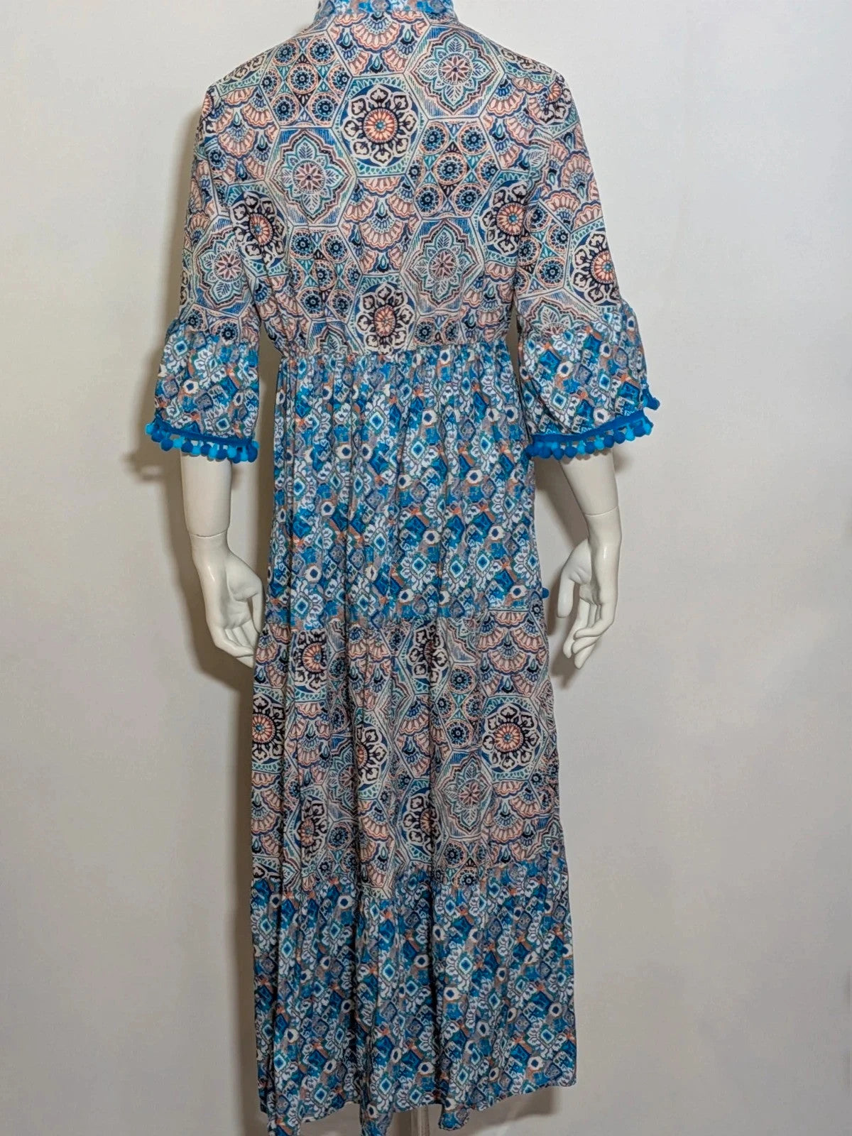 Per Una blue linen maxi dress with geometric mandala pattern and royal blue pompom details.