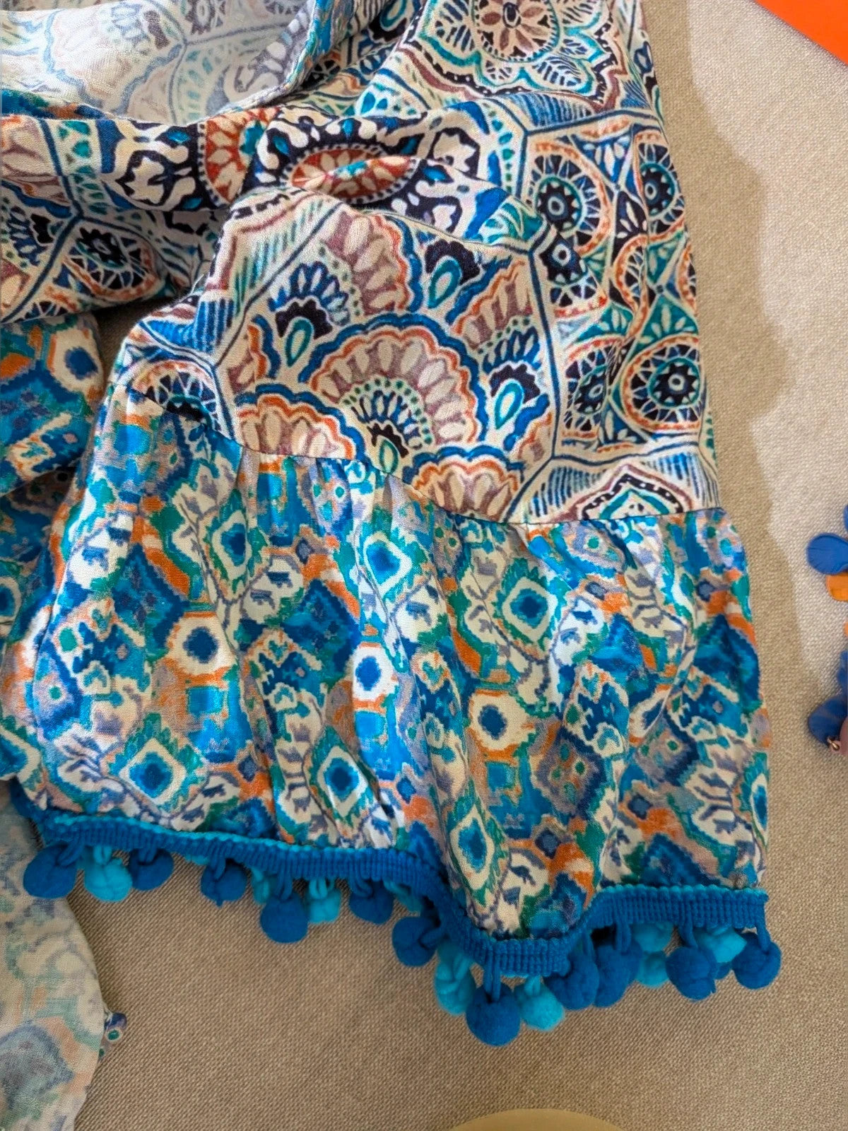 Per Una blue linen maxi dress with geometric mandala pattern and royal blue pompom details.