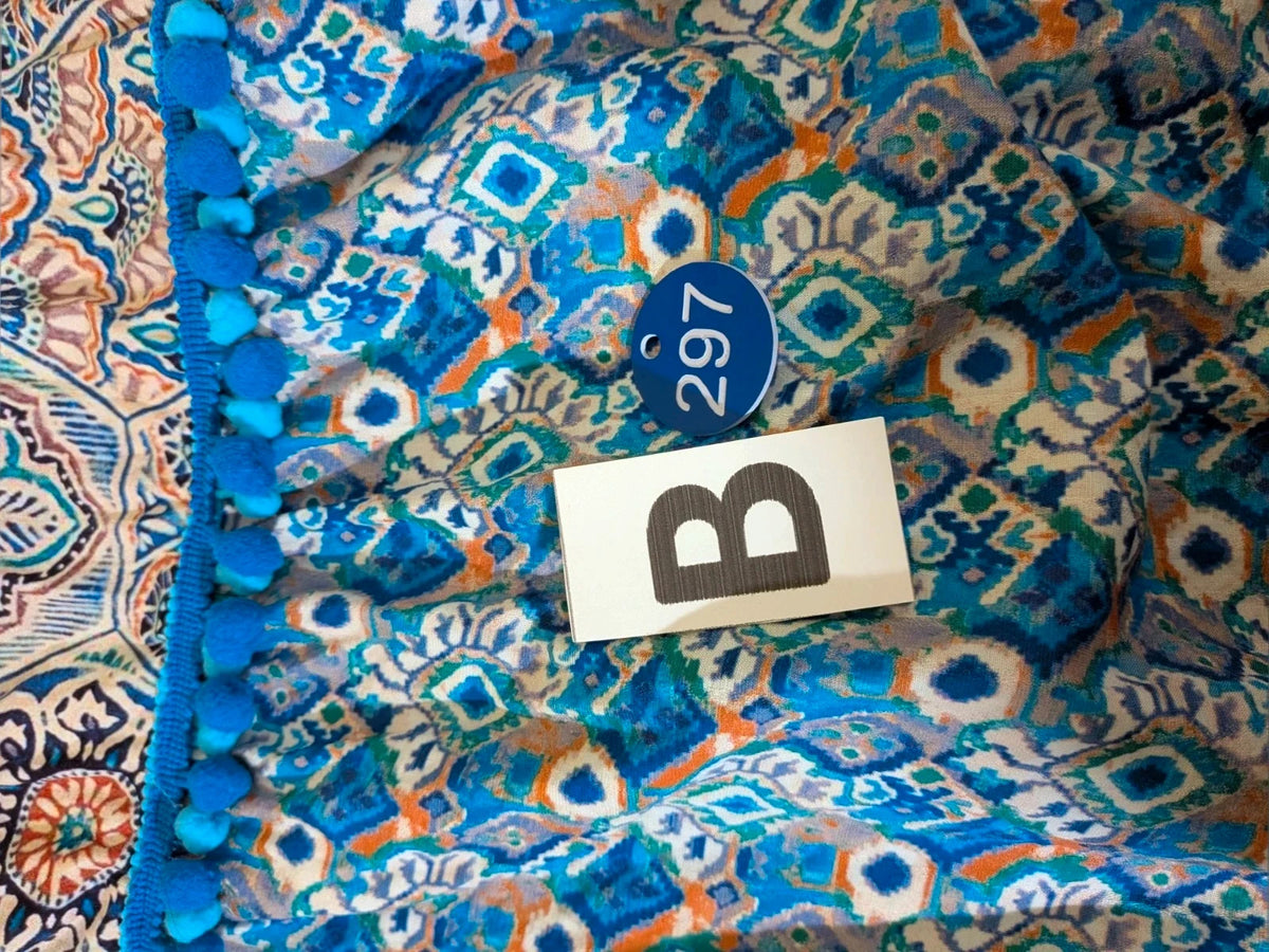 Per Una blue linen maxi dress with geometric mandala pattern and royal blue pompom details.