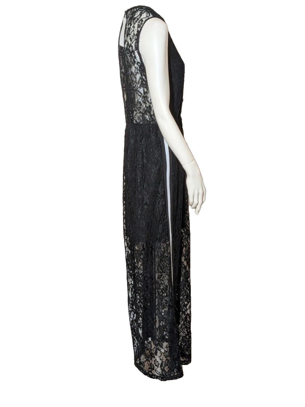 Chic black linen maxi dress with floral lace, white side stripe, and sleeveless design.