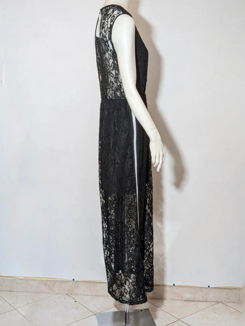 Chic black linen maxi dress with floral lace, white side stripe, and sleeveless design.