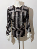 Le Mie Camicie black and grey silk top with unique geometric collar and button closure.