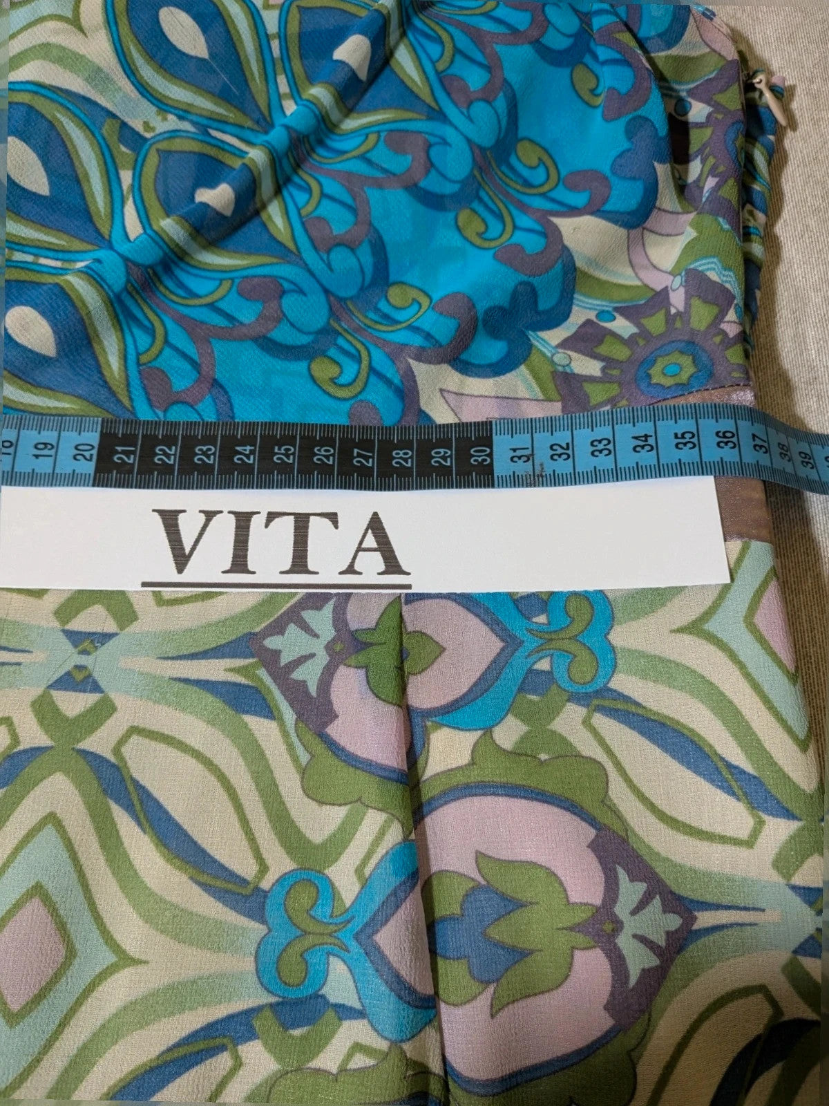 Camomilla Italia multi linen maxi dress with geometric peacock pattern and lightweight fabric.