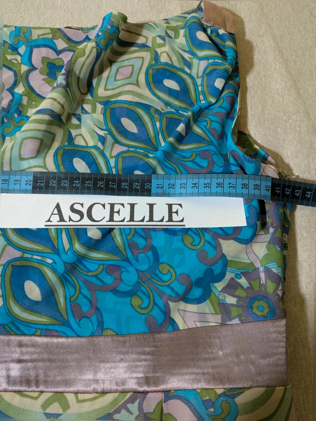 Camomilla Italia multi linen maxi dress with geometric peacock pattern and lightweight fabric.