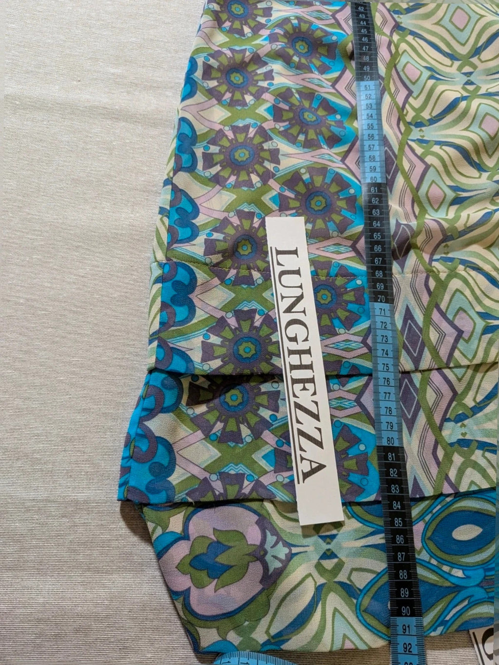 Camomilla Italia multi linen maxi dress with geometric peacock pattern and lightweight fabric.
