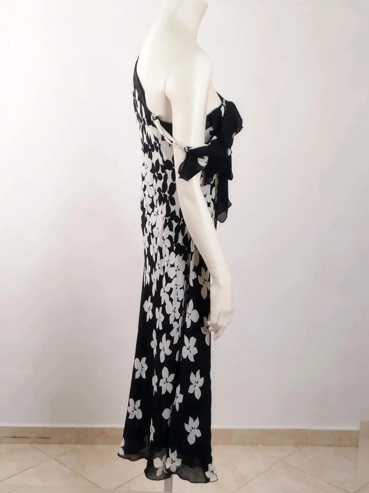 Cannella black and white floral linen maxi dress, one-shoulder design with ruffle detail.