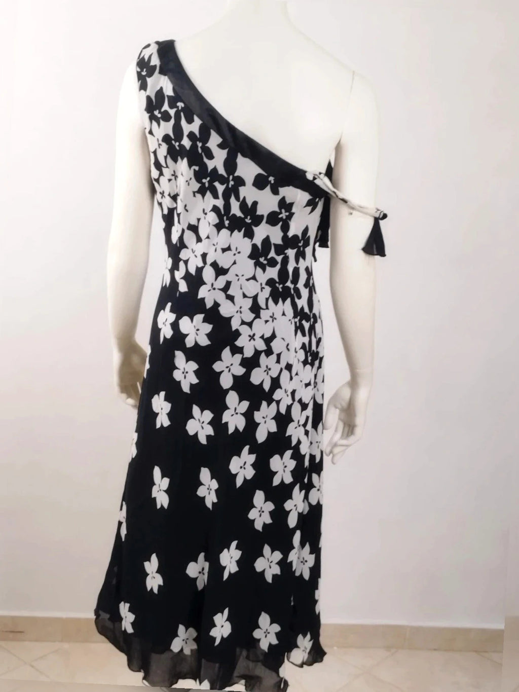 Cannella black and white floral linen maxi dress, one-shoulder design with ruffle detail.