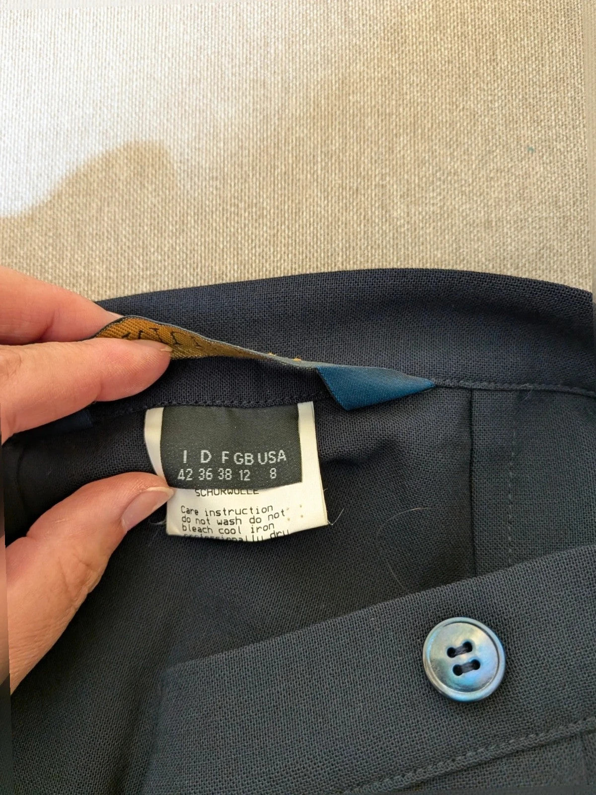 Mariella Burani navy skirt suit with elegant blazer and vintage bicycle print lining.