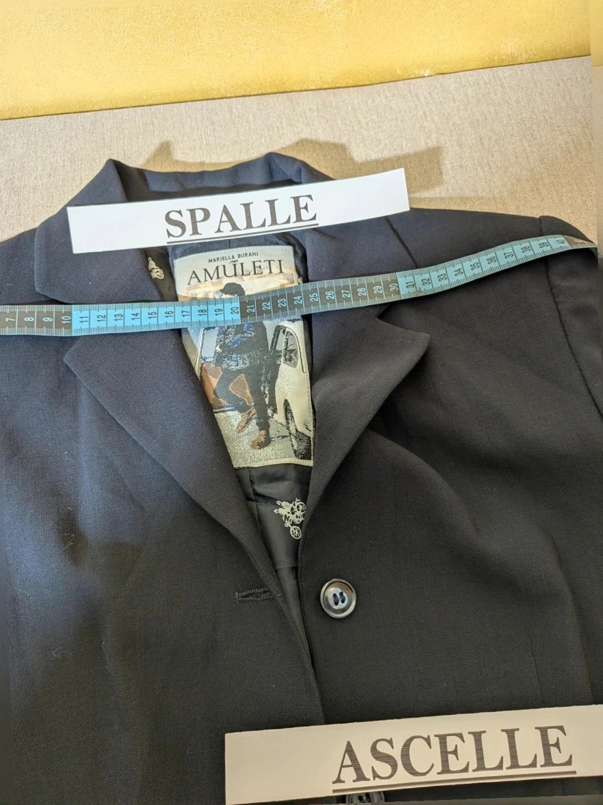 Mariella Burani navy skirt suit with elegant blazer and vintage bicycle print lining.