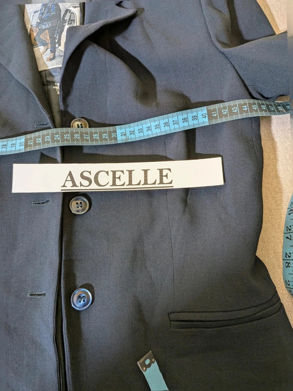 Mariella Burani navy skirt suit with elegant blazer and vintage bicycle print lining.