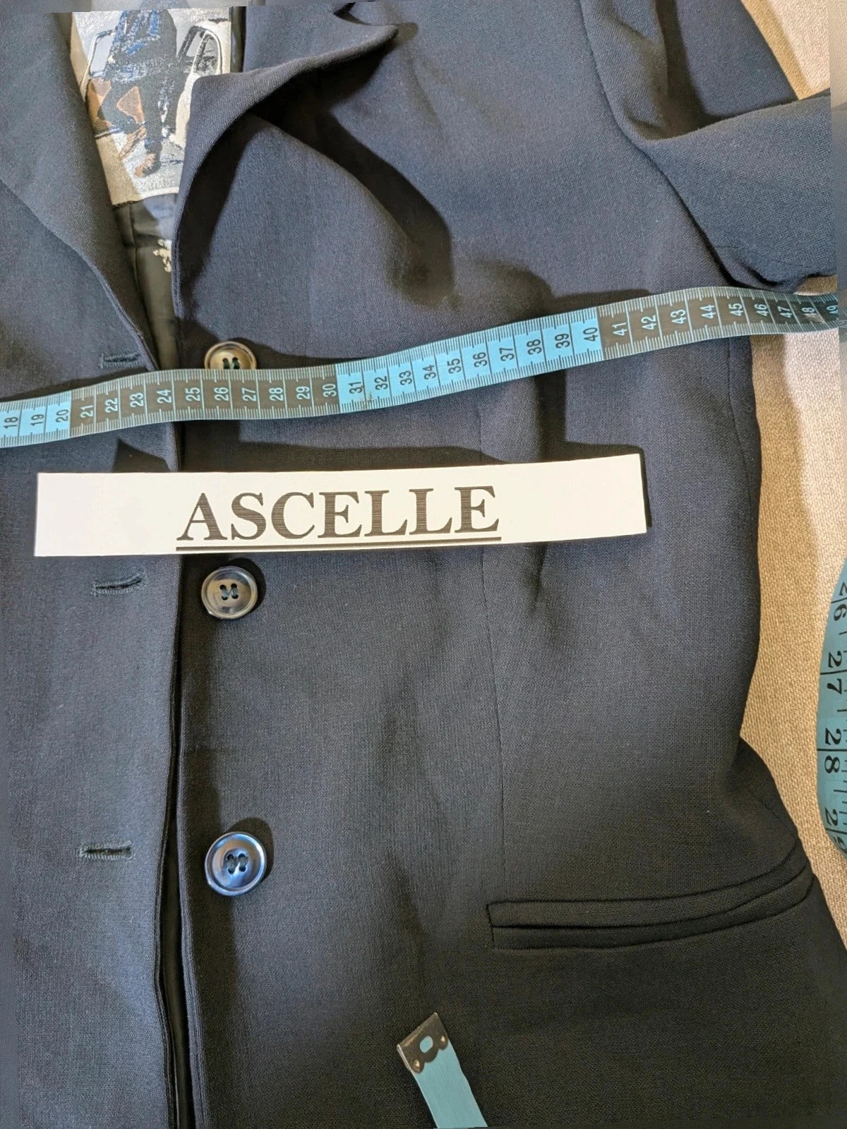 Mariella Burani navy skirt suit with elegant blazer and vintage bicycle print lining.