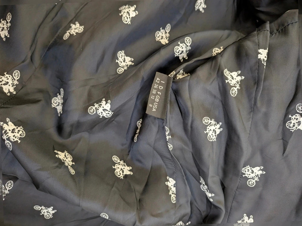 Mariella Burani navy skirt suit with elegant blazer and vintage bicycle print lining.