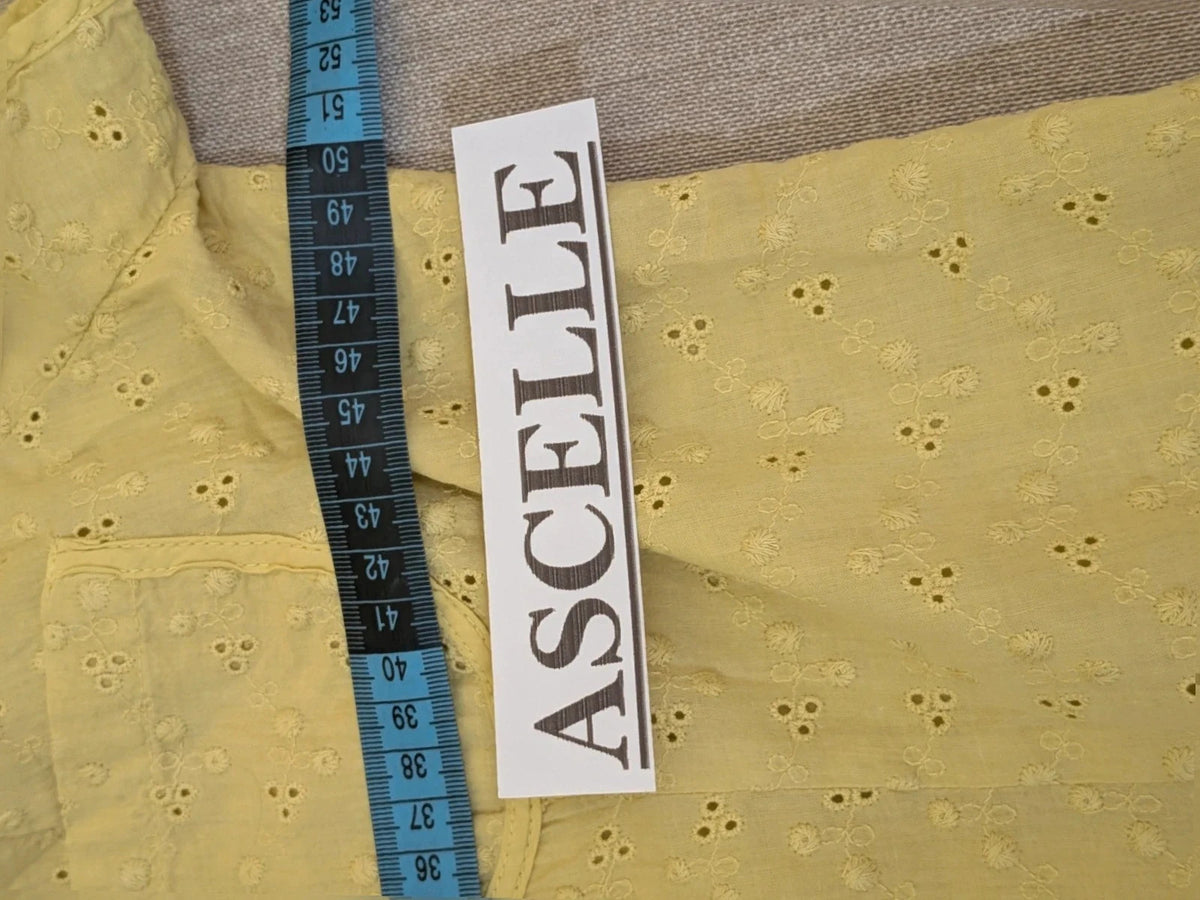 Guerini yellow short-sleeve top with lace Sangallo pattern and front button closure.