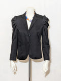 Extyn black blazer with puff sleeves, modern design, made in Italy, high-quality cotton.