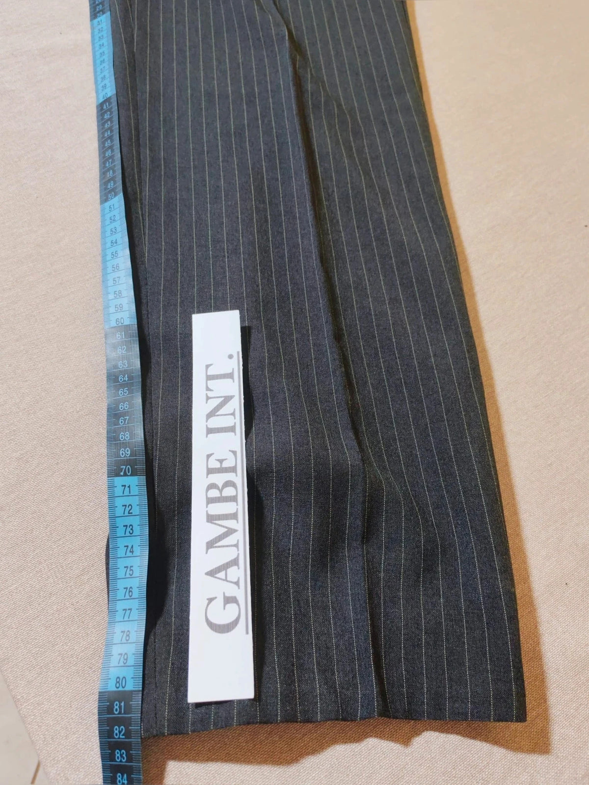 Per Una grey suit jacket and trousers, pinstripe pattern, three-button closure, excellent condition.