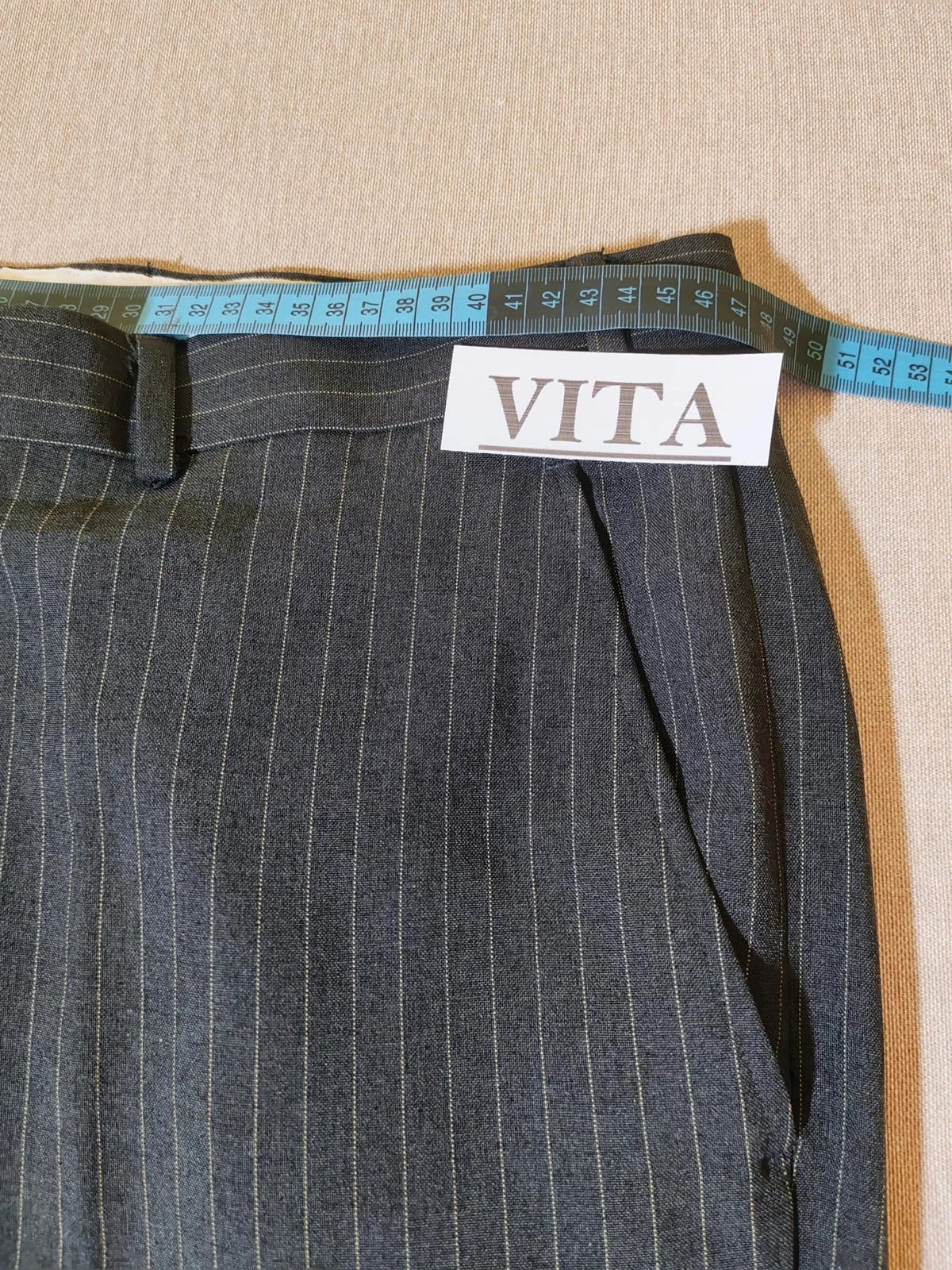 Per Una grey suit jacket and trousers, pinstripe pattern, three-button closure, excellent condition.