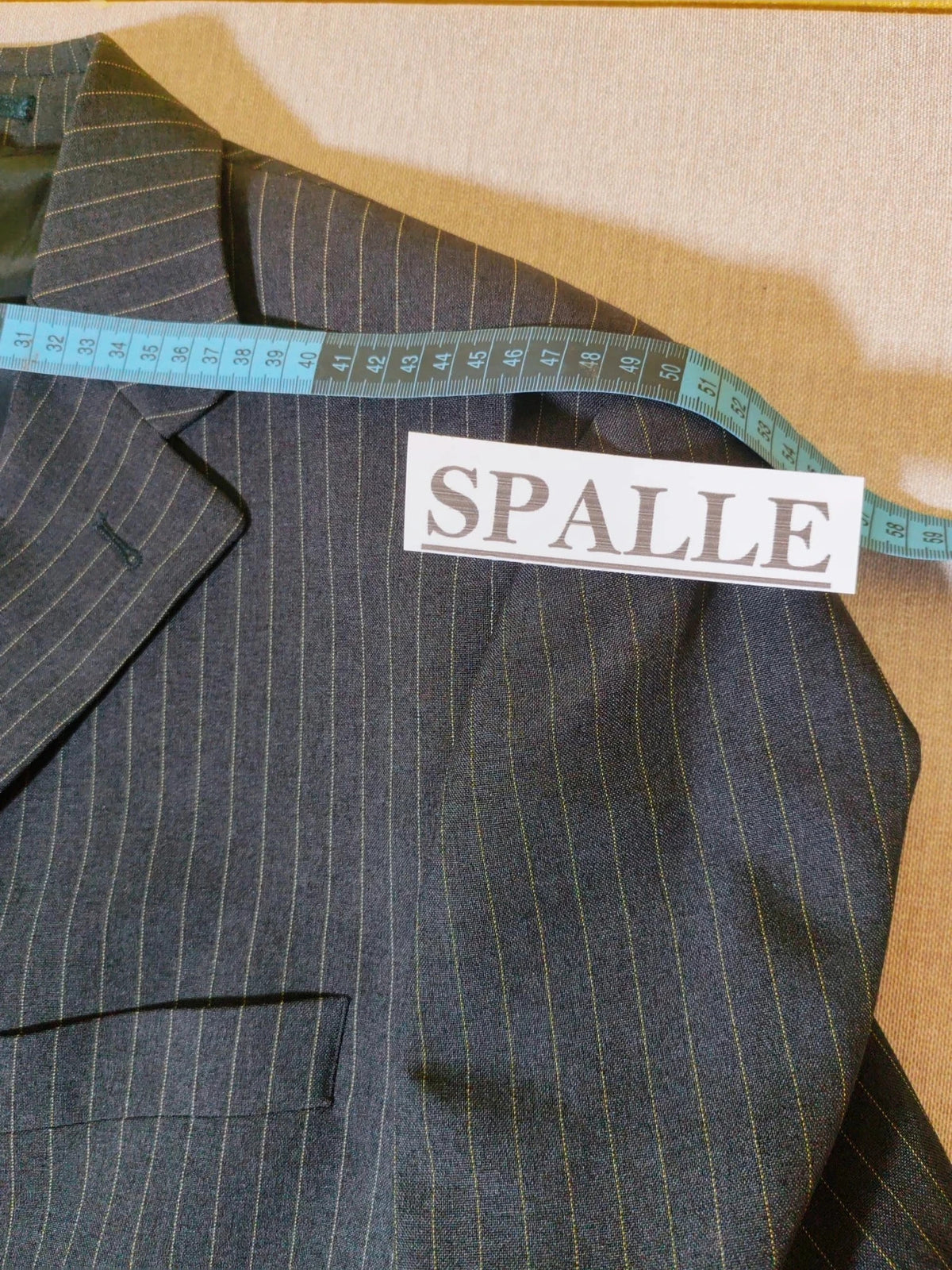 Per Una grey suit jacket and trousers, pinstripe pattern, three-button closure, excellent condition.