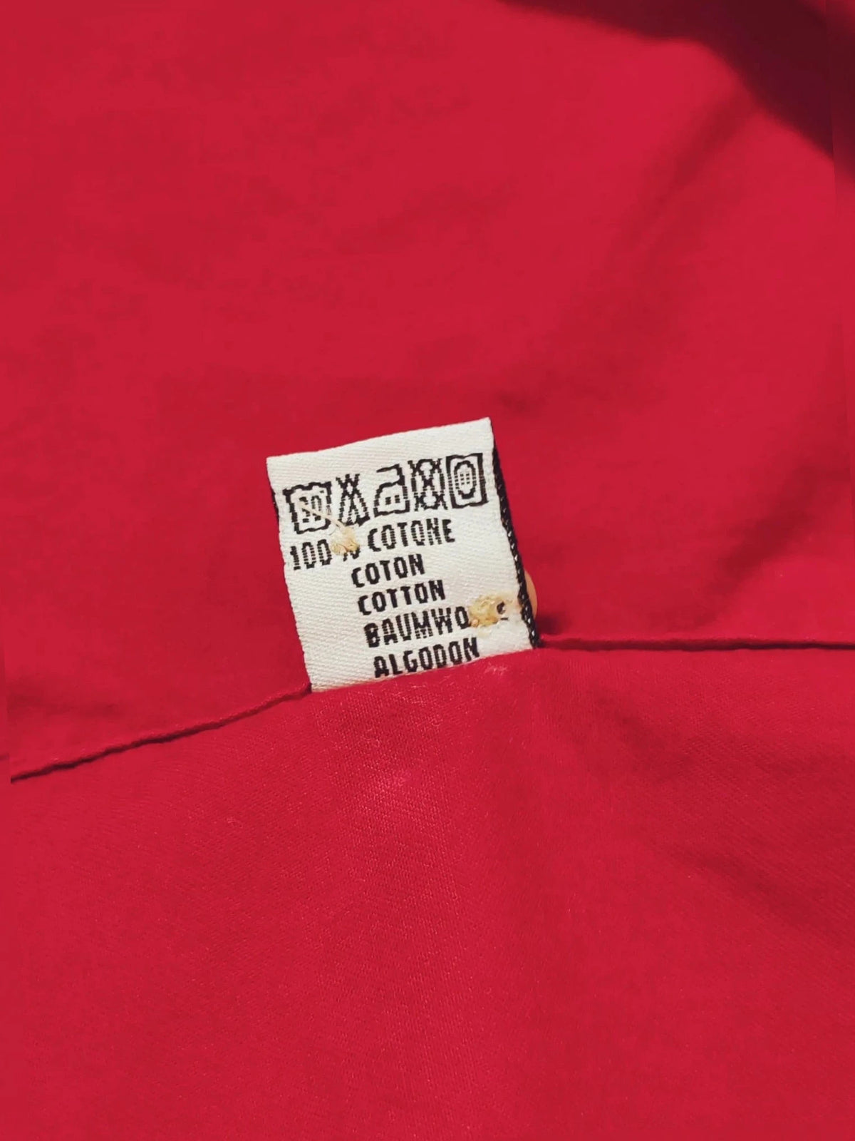 Boggi men's shirt burgundy button-down collar with textured buttons and chest pocket.