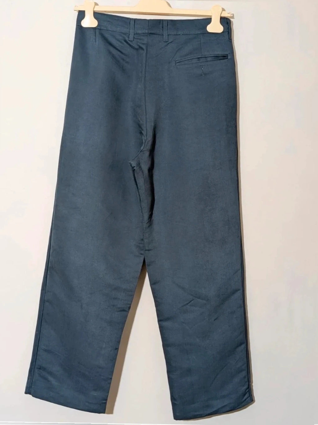 Vintage navy jacket and trousers set, luxurious silk-wool blend, elegant formal style.