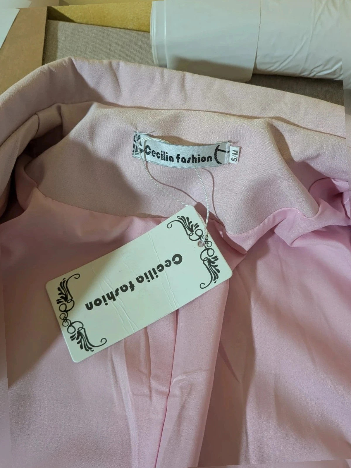 Cecilia Fashion pink double-breasted blazer with tonal covered buttons and classic lapels.