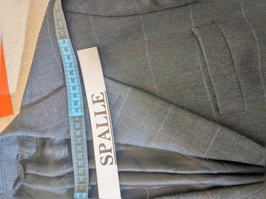 Up Grade Classico grey jacket herringbone pattern three-button front with pocket flaps.