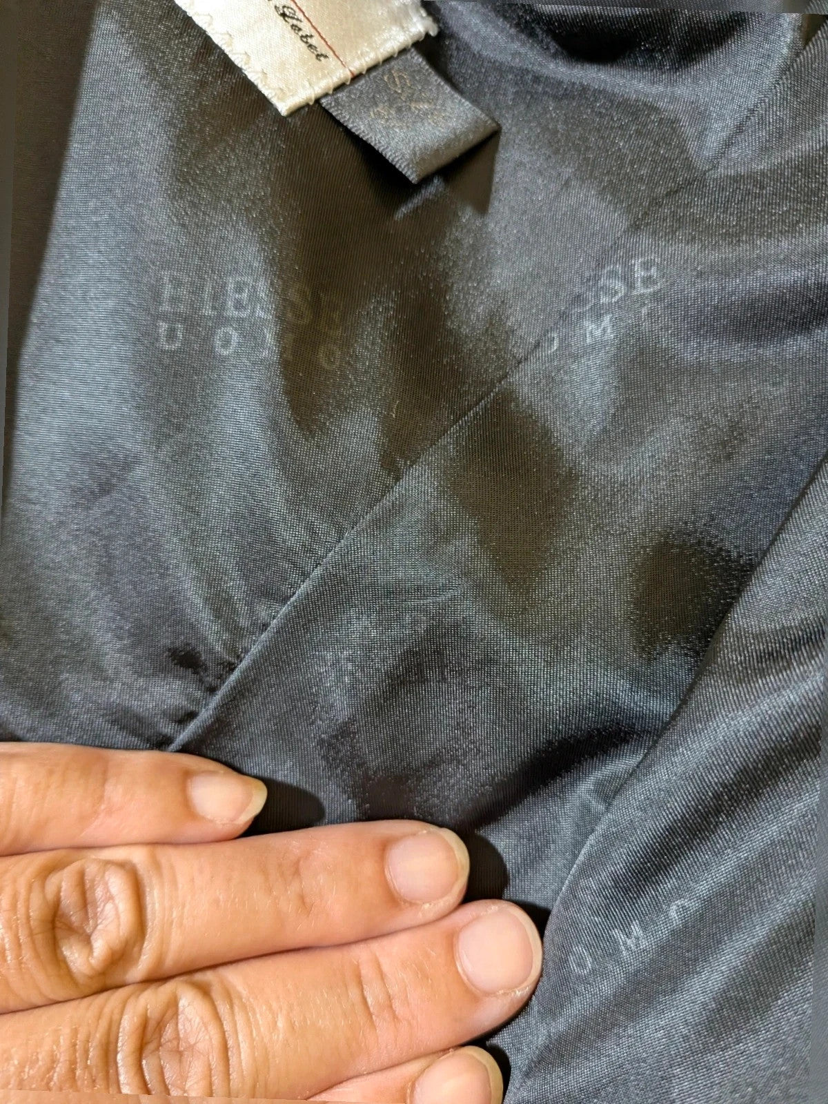 Biesse black jacket with subtle pinstripe pattern and Black Label logo.
