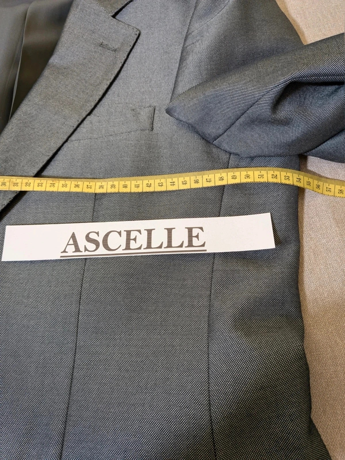 Giacomo Casanova grey jacket micro-flame pattern elegant formal wear.