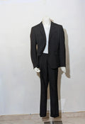 Radaus black suit with modern cut, purple contrast lining, soft viscose blend.