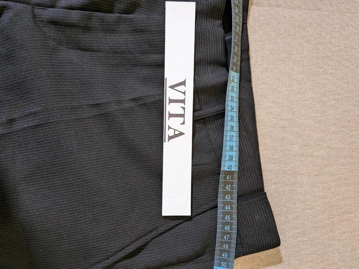 Radaus black suit with modern cut, purple contrast lining, soft viscose blend.