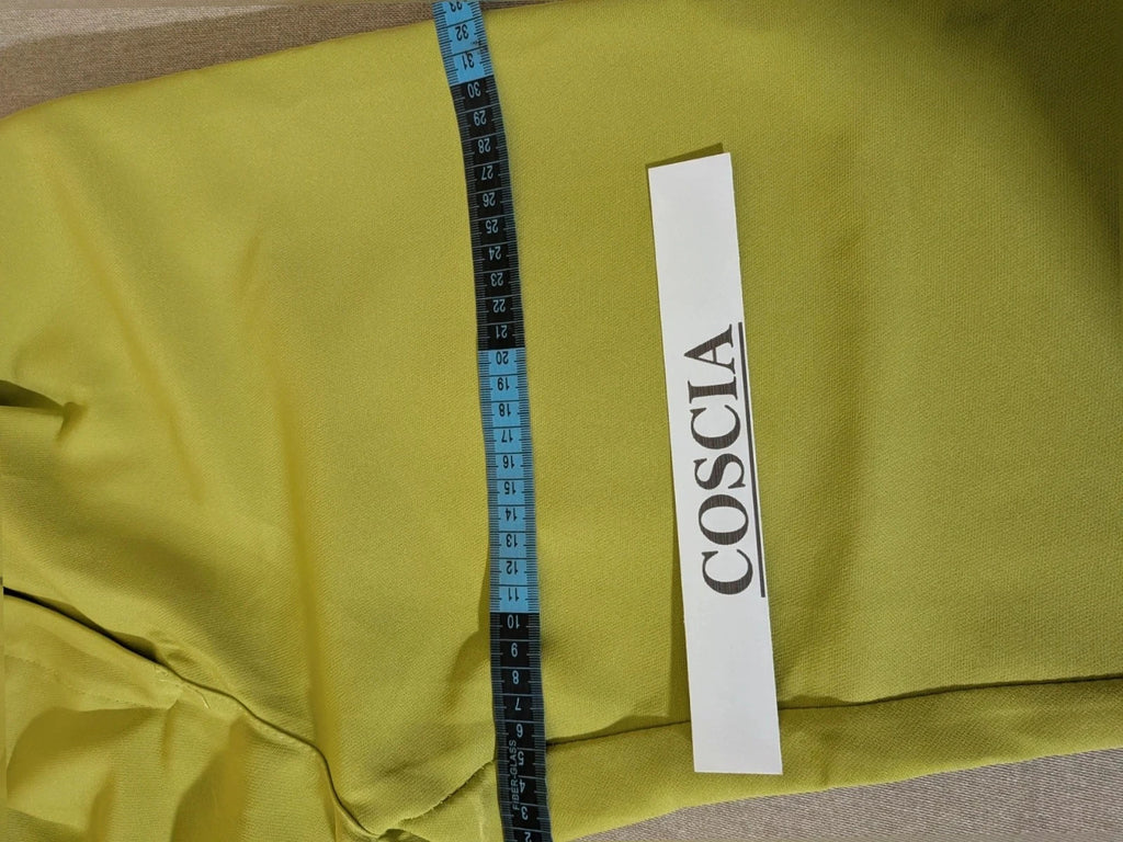 New Collection green suit set with fitted blazer, wide-leg trousers, and classic lapel details.