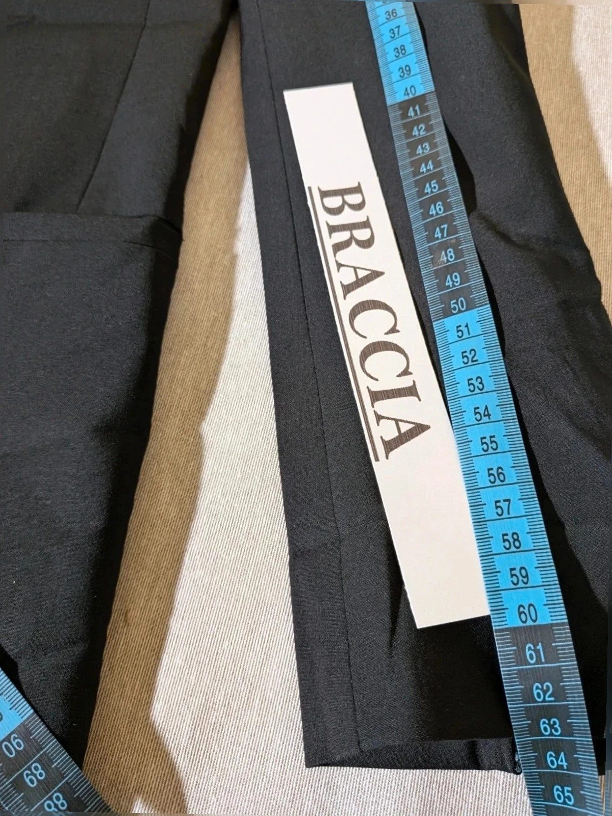 BENETTON black suit with COS blazer, minimalist design, high-quality wool blend fabric.