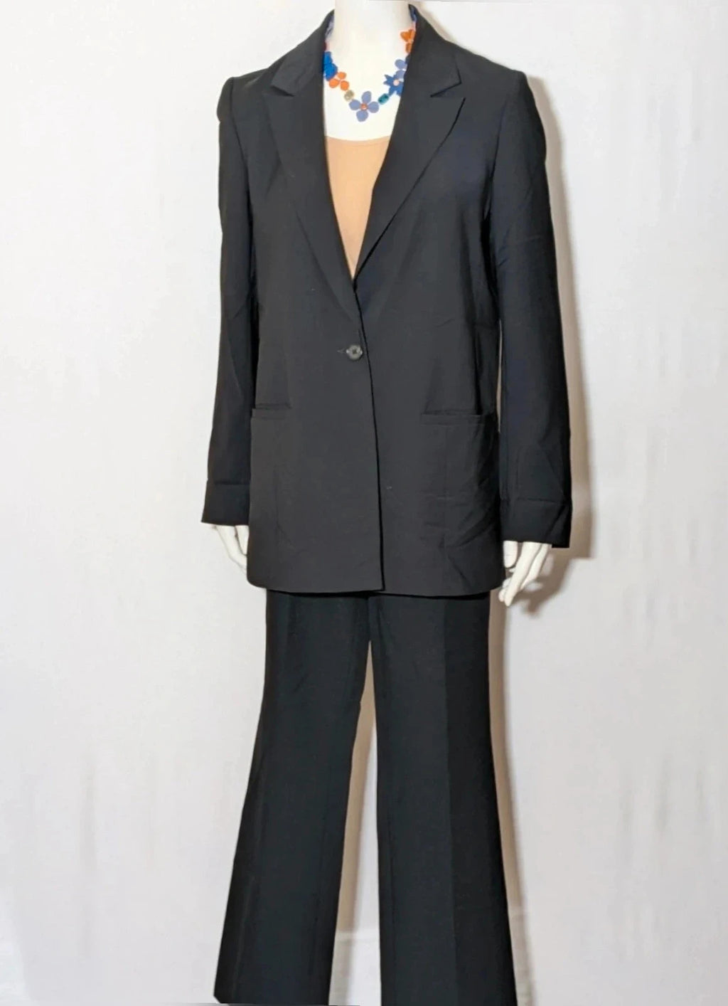 BENETTON black suit with COS blazer, minimalist design, high-quality wool blend fabric.