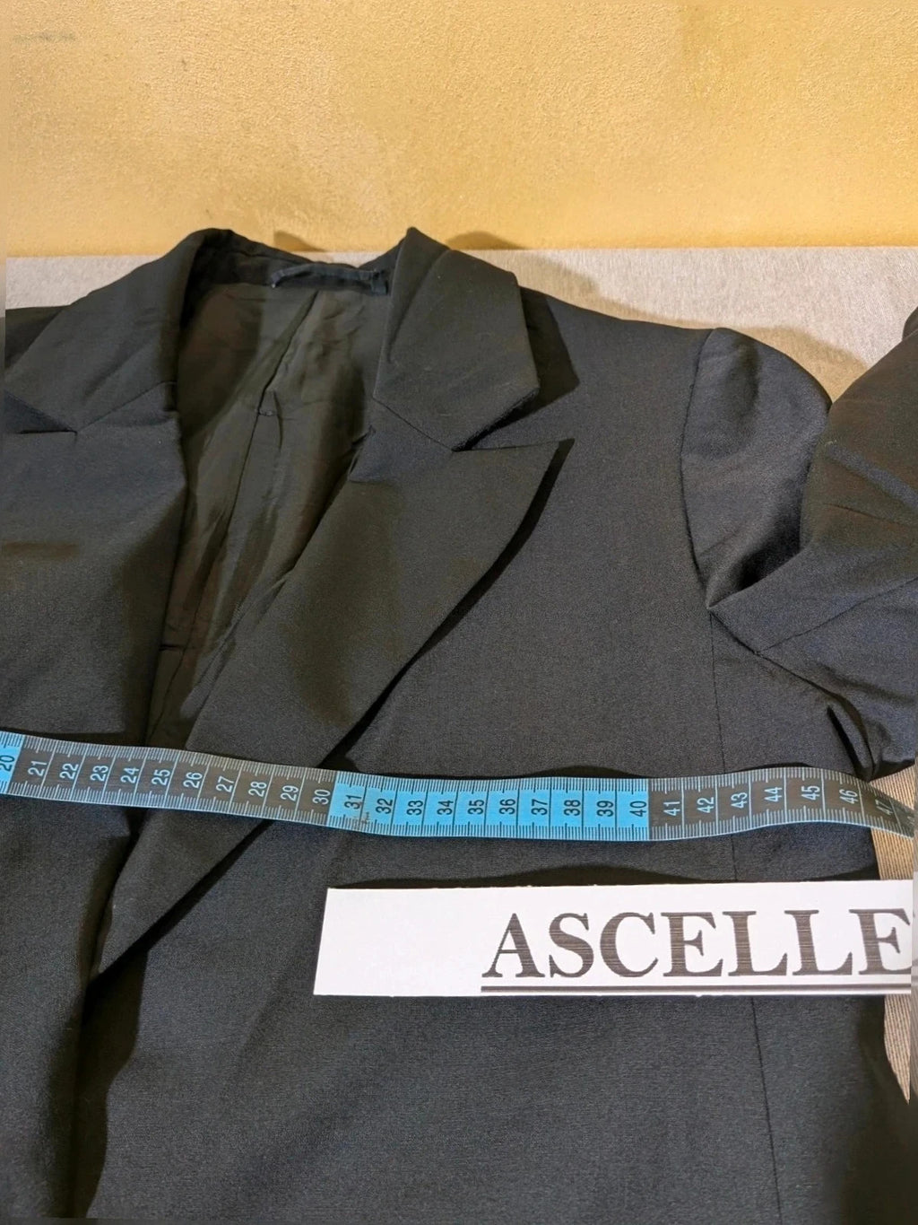 BENETTON black suit with COS blazer, minimalist design, high-quality wool blend fabric.