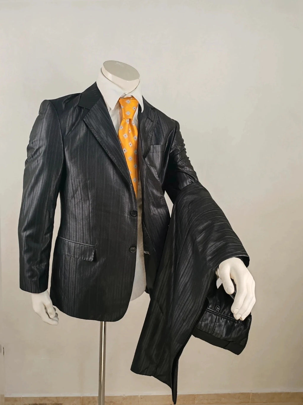Bossano black suit jacket and trousers, pinstripe pattern, luxurious satin finish, new with tags.