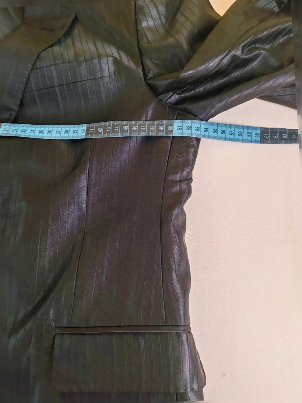 Bossano black suit jacket and trousers, pinstripe pattern, luxurious satin finish, new with tags.