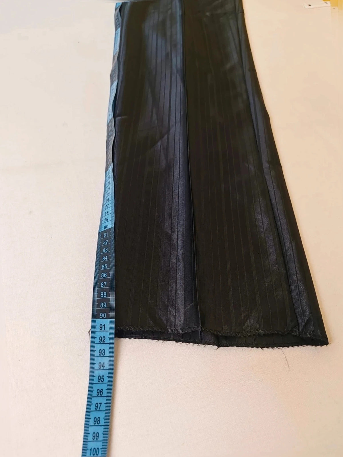 Bossano black suit jacket and trousers, pinstripe pattern, luxurious satin finish, new with tags.