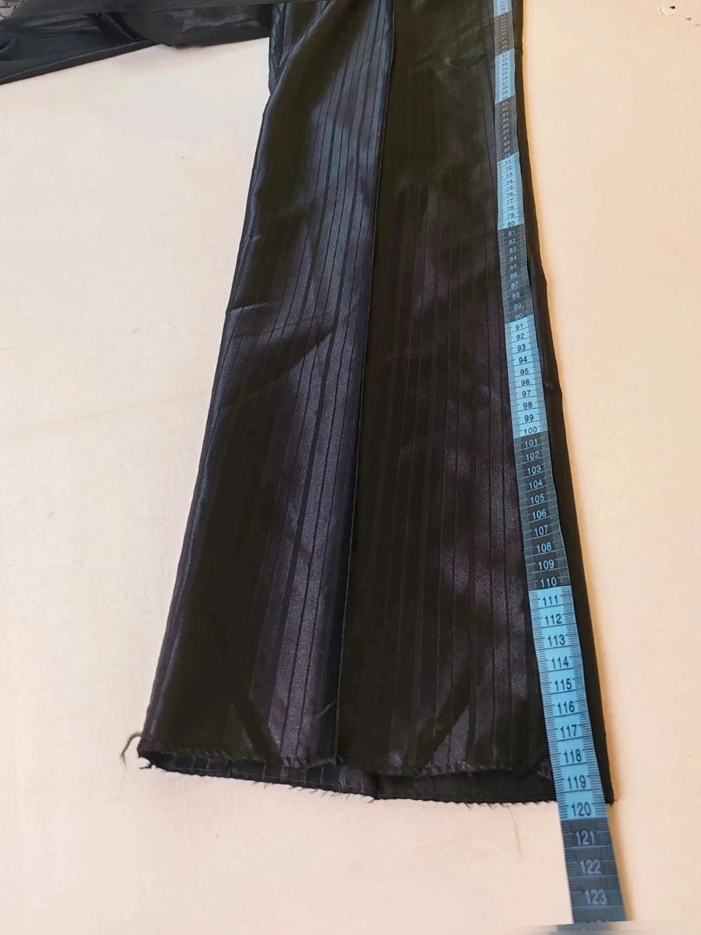 Bossano black suit jacket and trousers, pinstripe pattern, luxurious satin finish, new with tags.