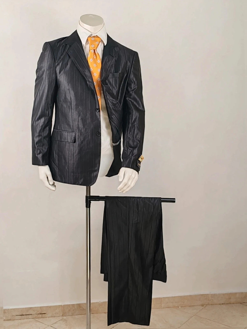 Bossano black suit jacket and trousers, pinstripe pattern, luxurious satin finish, new with tags.