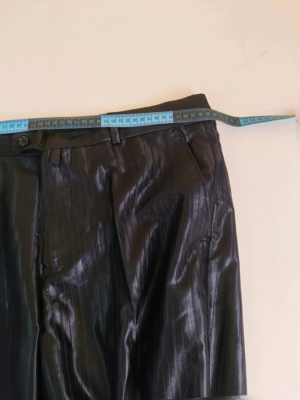 Bossano black suit jacket and trousers, pinstripe pattern, luxurious satin finish, new with tags.