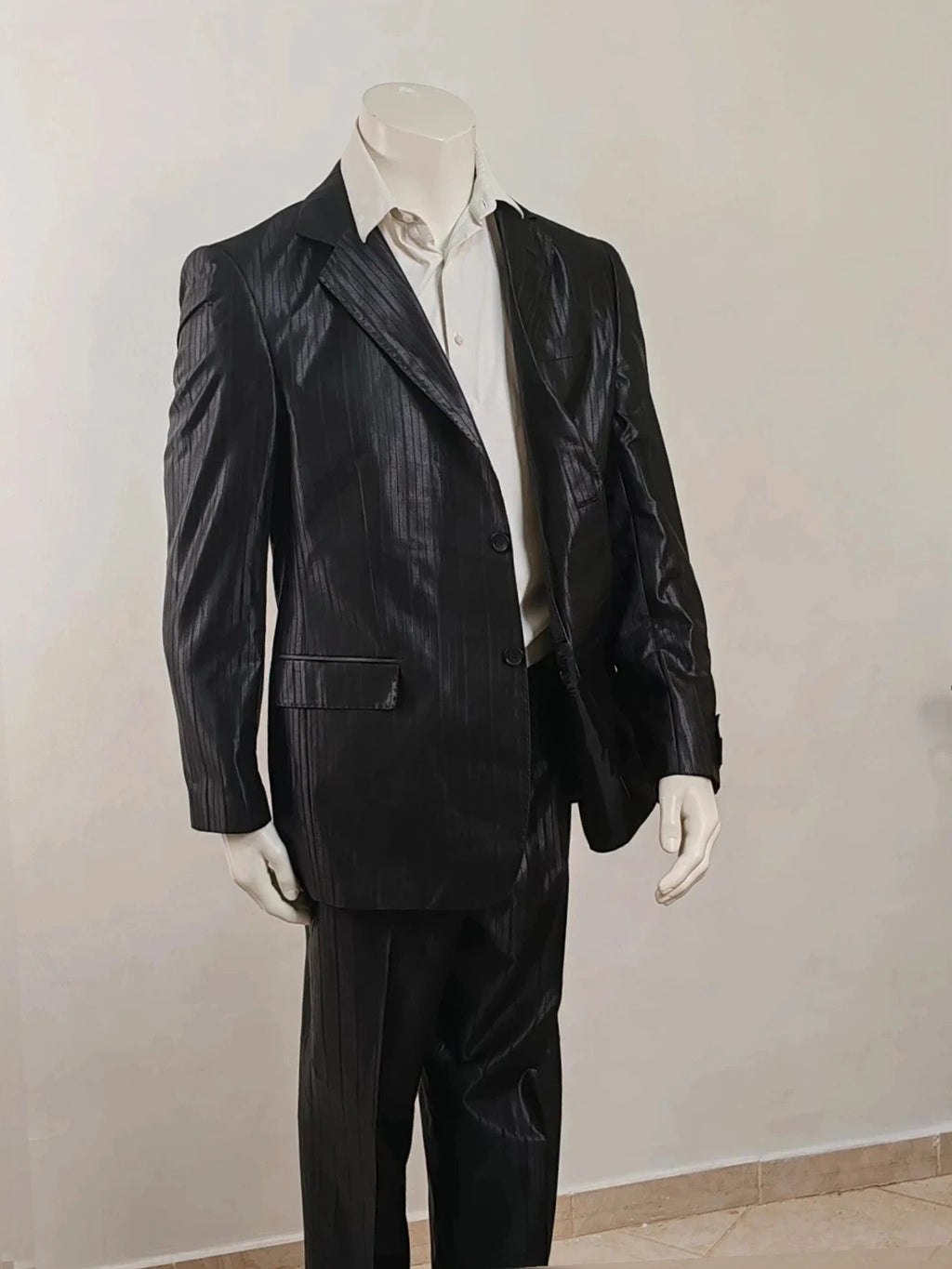 Bossano black suit jacket and trousers, pinstripe pattern, luxurious satin finish, new with tags.