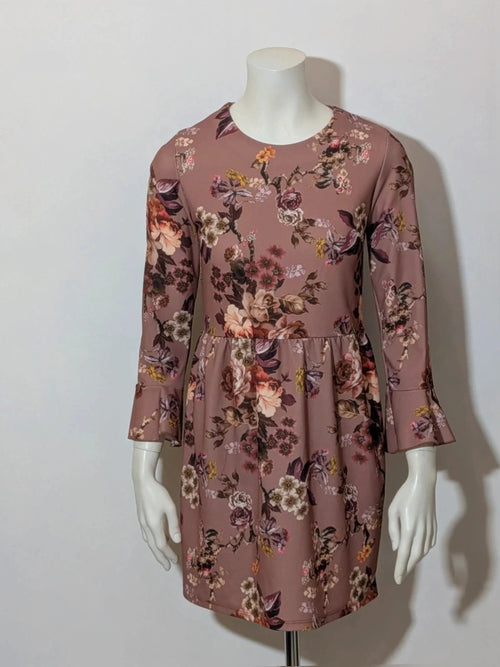 Lumina multi floral dress with 3/4 sleeves and ruffled cuffs, soft stretch fabric.