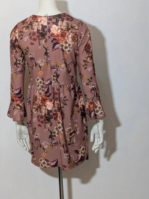 Lumina multi floral dress with 3/4 sleeves and ruffled cuffs, soft stretch fabric.