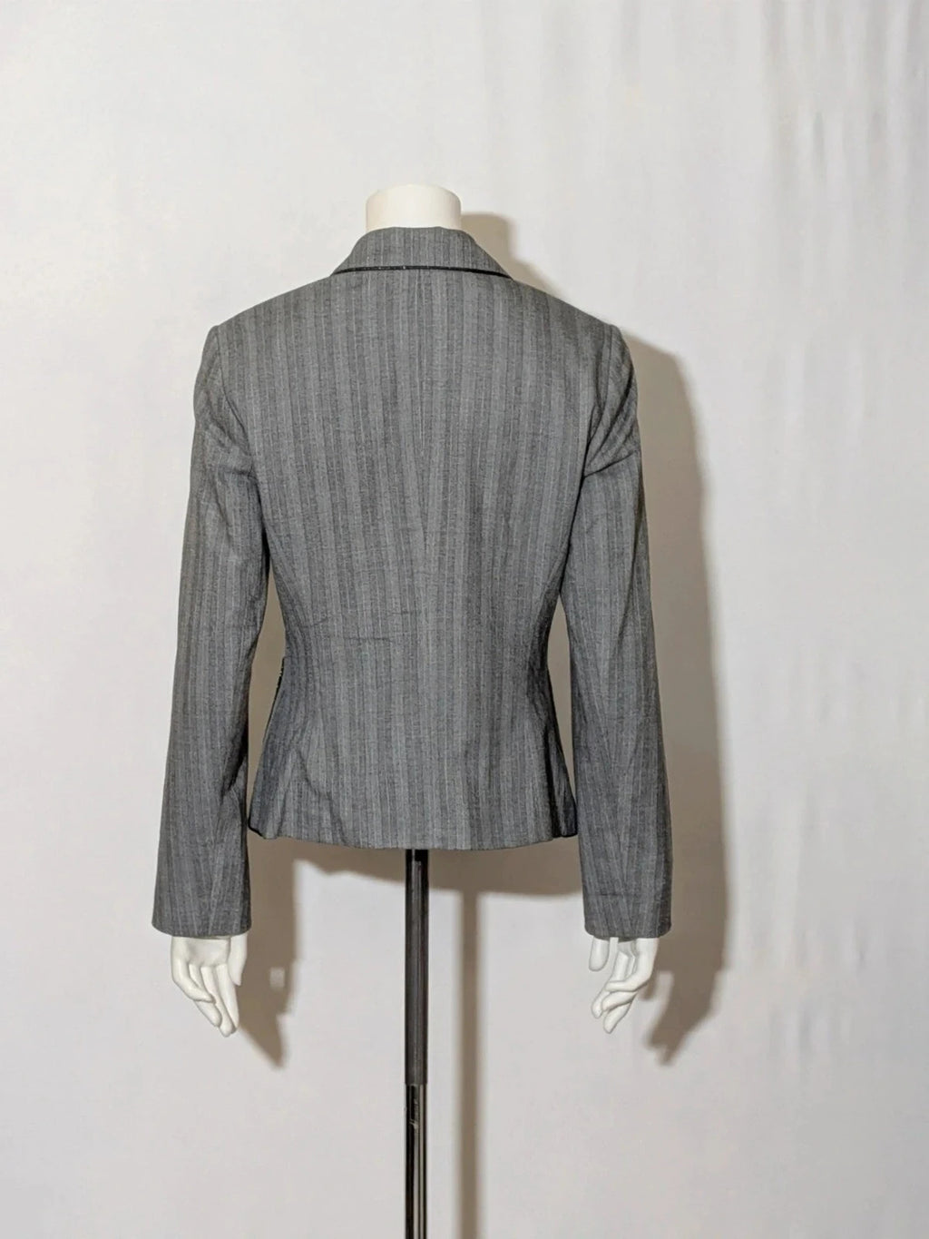Taifun grey pinstriped blazer with satin black trim and logo lining.