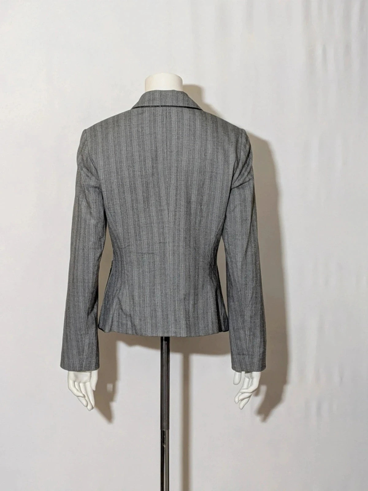 Taifun grey pinstriped blazer with satin black trim and logo lining.