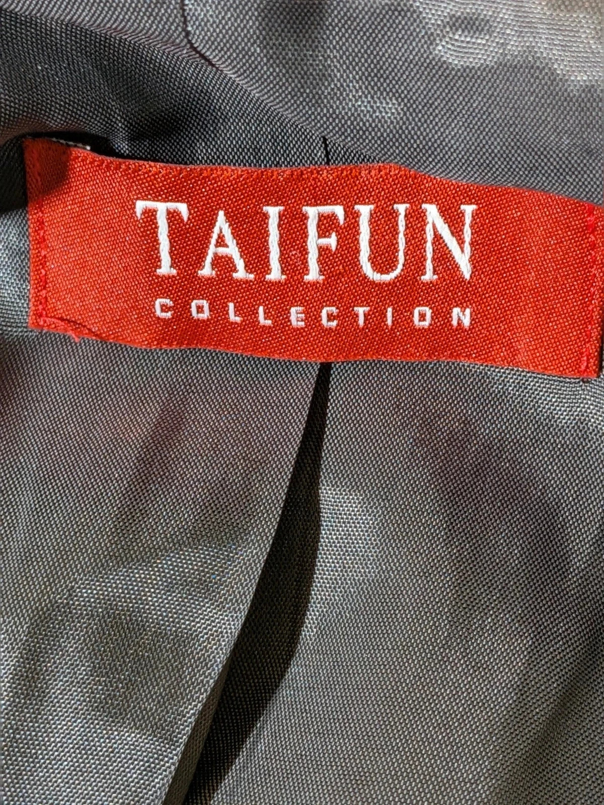 Taifun grey pinstriped blazer with satin black trim and logo lining.