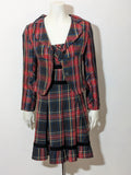 Made in Italy multi tartan skirt suit with black velvet details and structured bolero jacket.