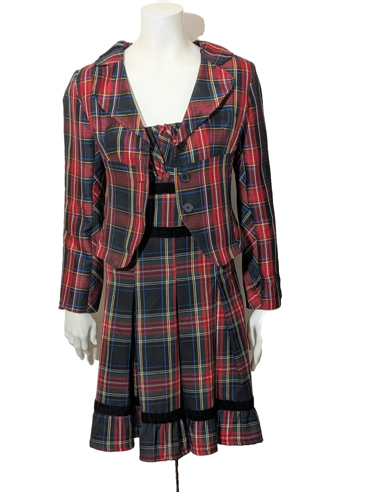 Made in Italy multi tartan skirt suit with black velvet details and structured bolero jacket.