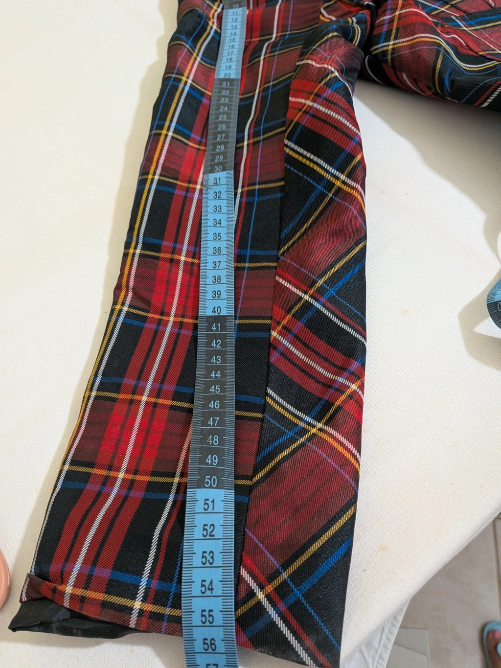 Made in Italy multi tartan skirt suit with black velvet details and structured bolero jacket.
